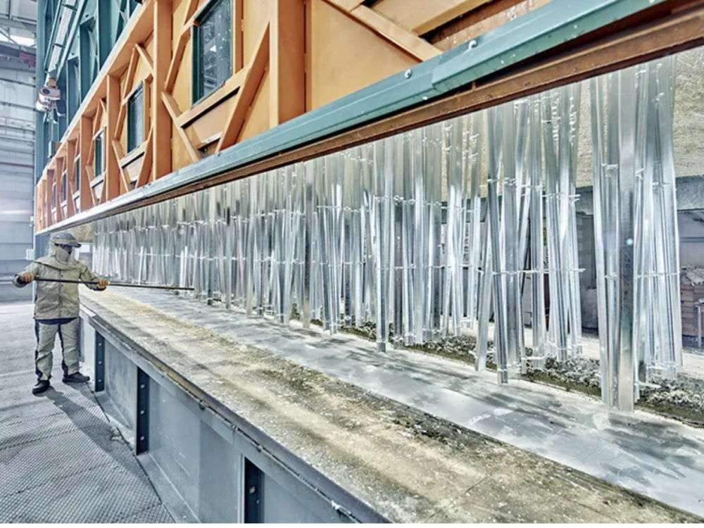 Steel sections freshly galvanized at hot-dip galvanizing plant