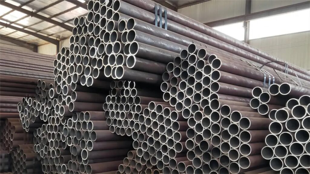 Seamless steel pipes stacked in warehouse