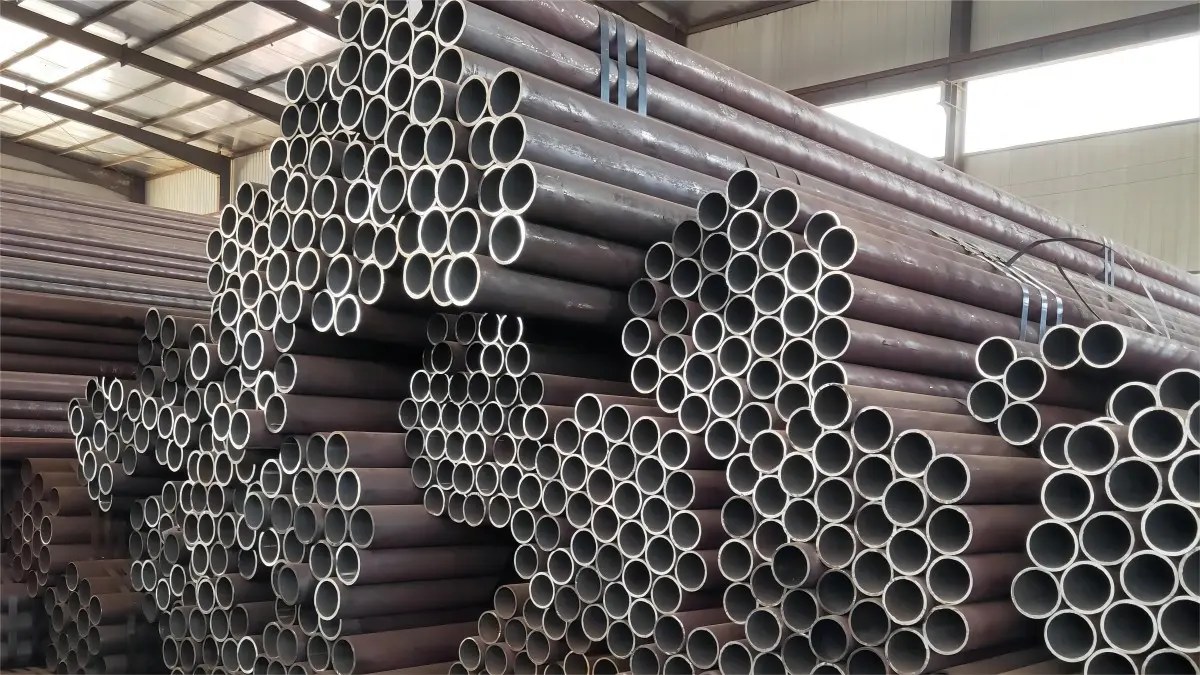 Seamless steel pipes stacked in warehouse