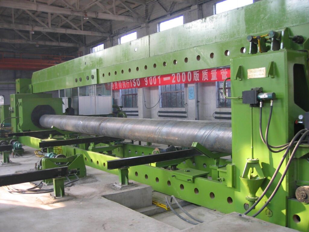 Spiral welded pipe set in a pressure test rig